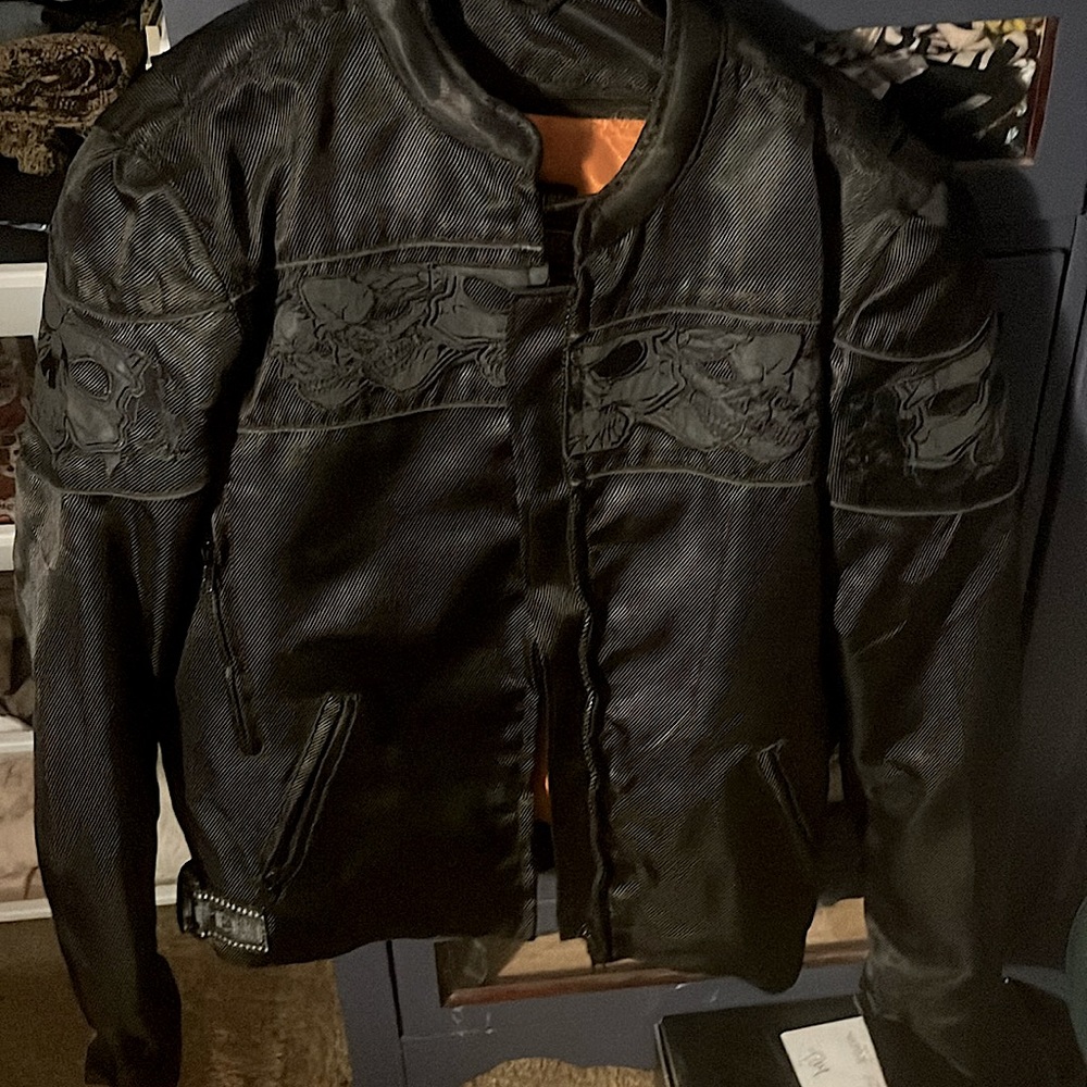 Motorcycle Jacket for all Seasons comes w/ bike pads in arms. Extra pockets etc
